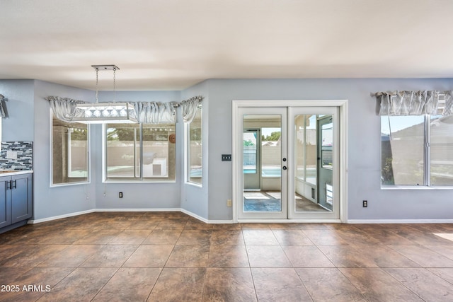 1638 N Avoca, Mesa, AZ 85207 - unfurnished dining area featuring tile patterned flooring, baseboards, and french doors