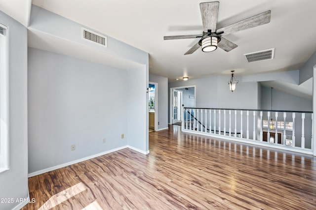 1638 N Avoca, Mesa, AZ 85207 - spare room featuring wood finished floors, a ceiling fan, and baseboards