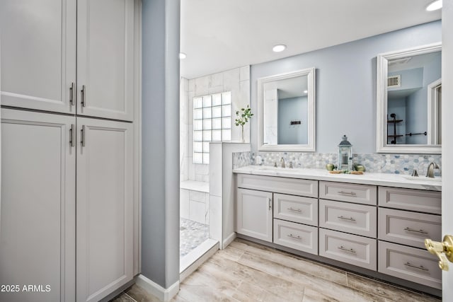 1638 N Avoca, Mesa, AZ 85207 - full bathroom featuring double vanity, walk in shower, wood finished floors, and recessed lighting