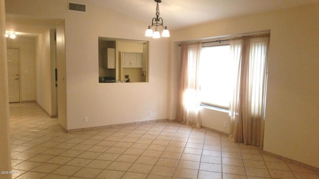 empty room featuring light tile patterned floors, baseboards, visible vents, an inviting chandelier, and lofted ceiling