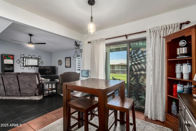 dining area featuring ceiling fan