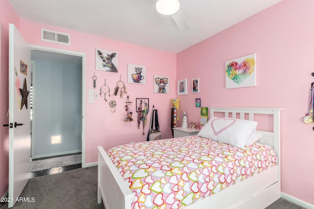 carpeted bedroom with baseboards, visible vents, and ceiling fan