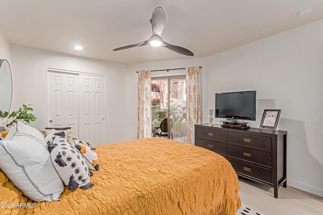 bedroom with a ceiling fan, recessed lighting, light wood finished floors, and a closet