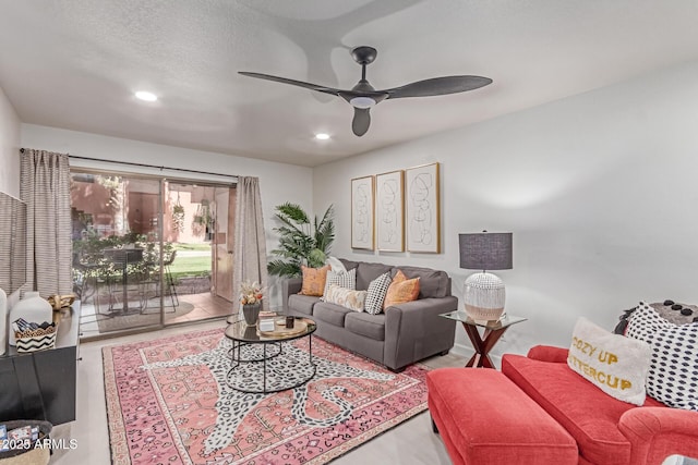 living room with recessed lighting, a ceiling fan, and wood finished floors