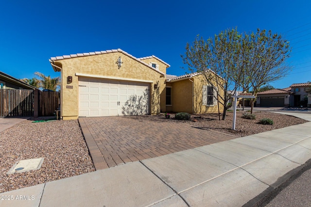 view of front of property with a garage