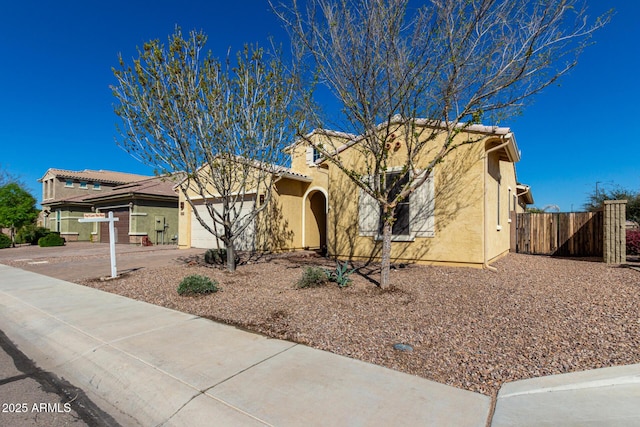 view of front of home with a garage