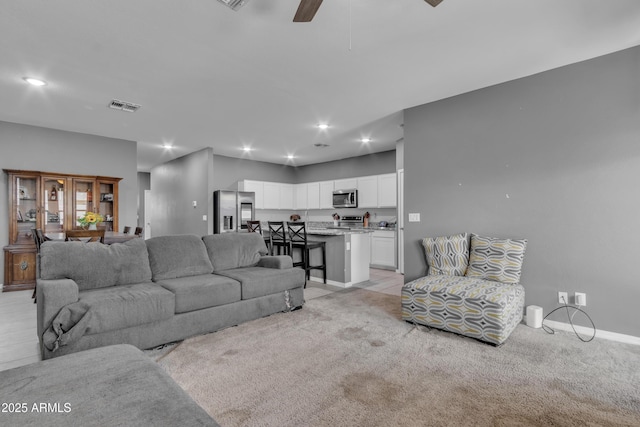 6085 E Athena Rd, Florence, AZ 85132 - living area with a ceiling fan, recessed lighting, and light carpet