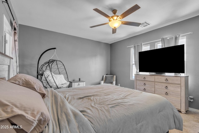 6085 E Athena Rd, Florence, AZ 85132 - bedroom with light carpet and a ceiling fan