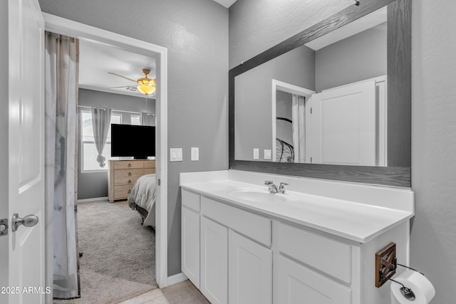 6085 E Athena Rd, Florence, AZ 85132 - ensuite bathroom with vanity and ceiling fan