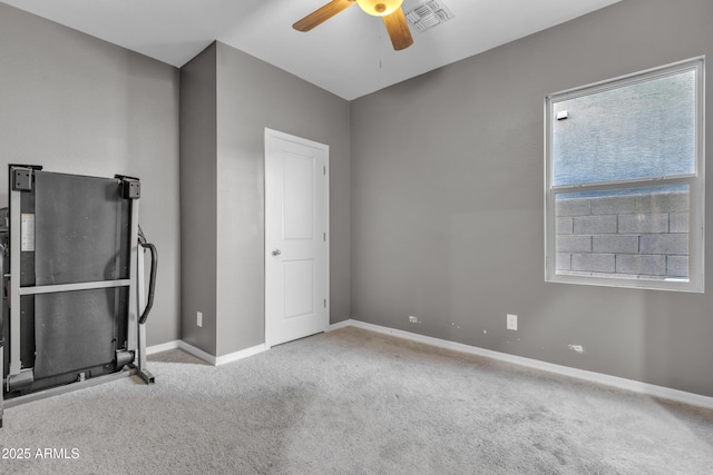 6085 E Athena Rd, Florence, AZ 85132 - unfurnished bedroom featuring carpet flooring and ceiling fan