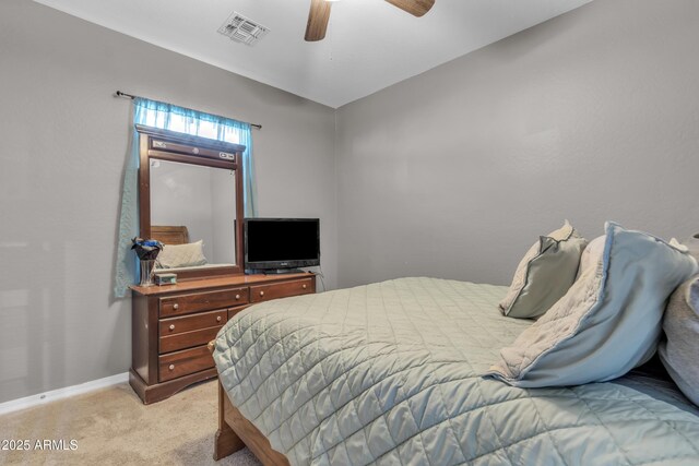 6085 E Athena Rd, Florence, AZ 85132 - bedroom featuring light colored carpet and ceiling fan