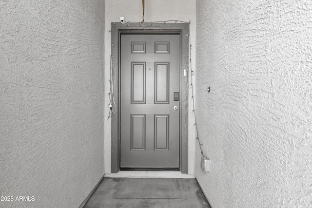 6085 E Athena Rd, Florence, AZ 85132 - doorway to property featuring stucco siding