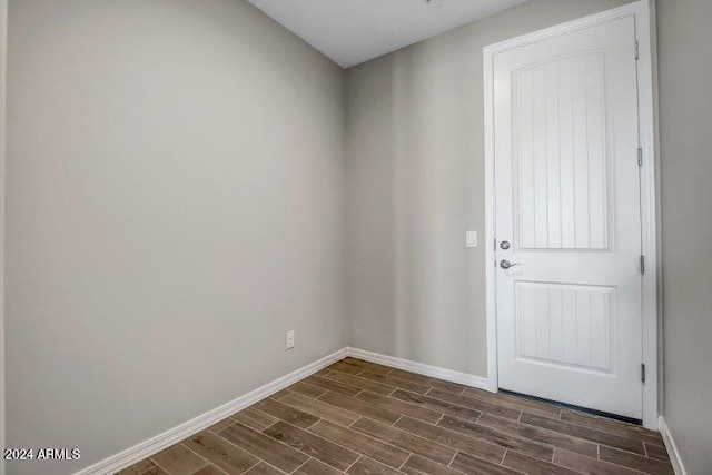 spare room featuring dark hardwood / wood-style floors