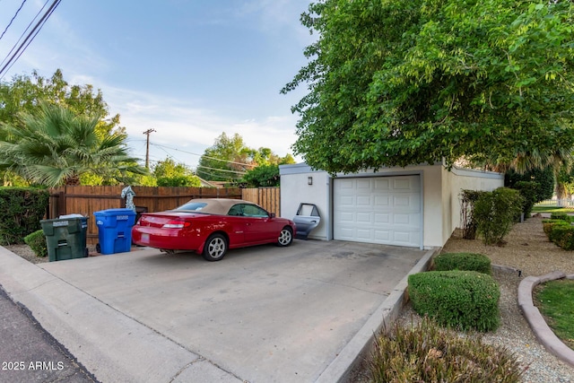 301 W Royal Palm Rd, Phoenix, AZ 85021 - detached garage featuring concrete driveway