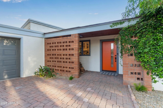 301 W Royal Palm Rd, Phoenix, AZ 85021 - view of exterior entry with stucco siding