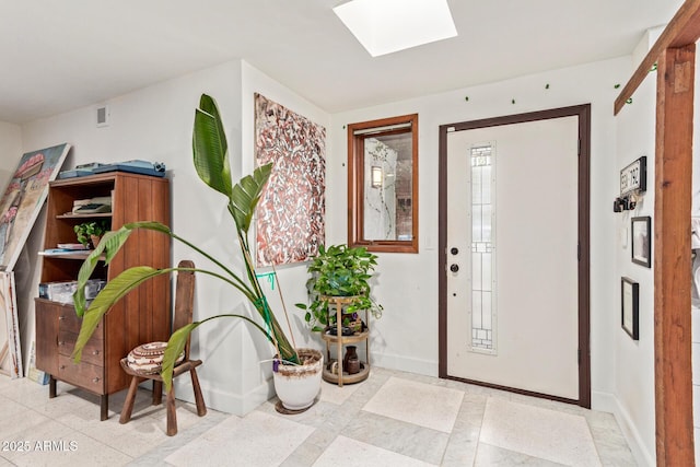 301 W Royal Palm Rd, Phoenix, AZ 85021 - foyer with a skylight and baseboards