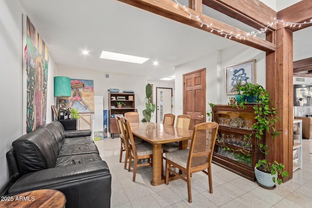 301 W Royal Palm Rd, Phoenix, AZ 85021 - dining space featuring a skylight and recessed lighting