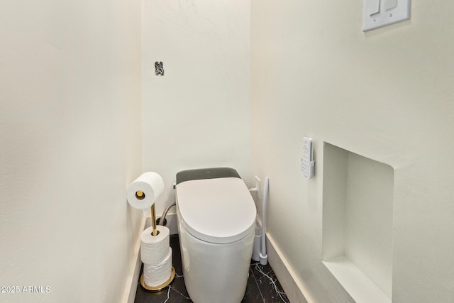 301 W Royal Palm Rd, Phoenix, AZ 85021 - bathroom with toilet and baseboards