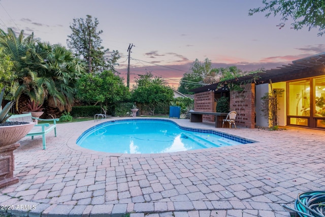301 W Royal Palm Rd, Phoenix, AZ 85021 - pool at dusk with a patio