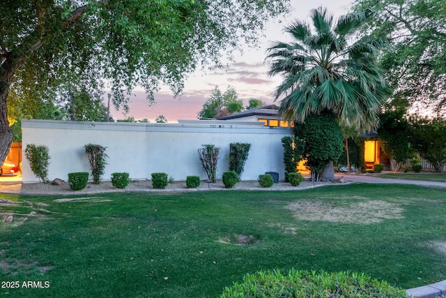 301 W Royal Palm Rd, Phoenix, AZ 85021 - view of front of home with a front yard and stucco siding