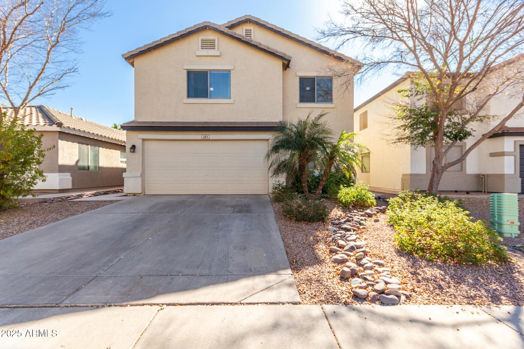 front of property with a garage