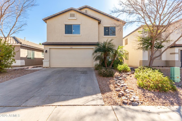 front of property with a garage