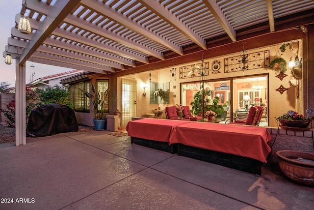 view of patio with a grill and a pergola