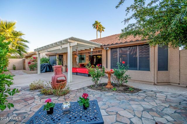 exterior space with a pergola and a patio