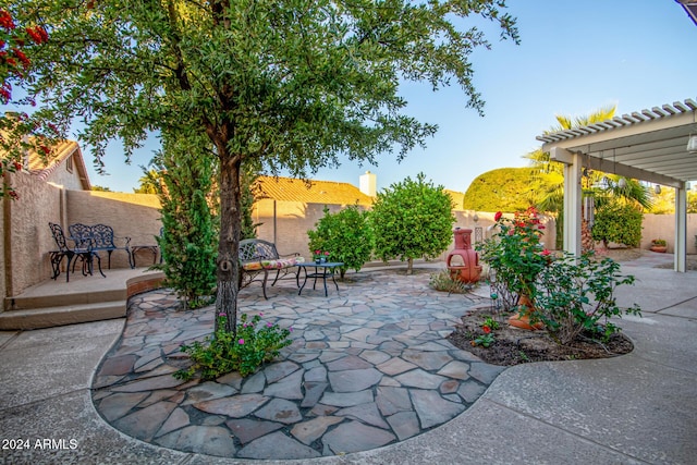 view of patio featuring a pergola