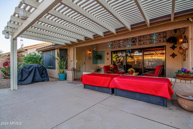 view of patio / terrace featuring a pergola and area for grilling