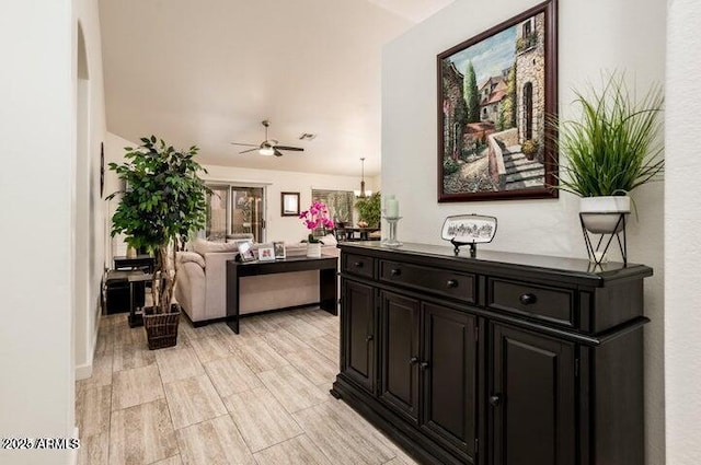 interior space featuring ceiling fan and light hardwood / wood-style floors