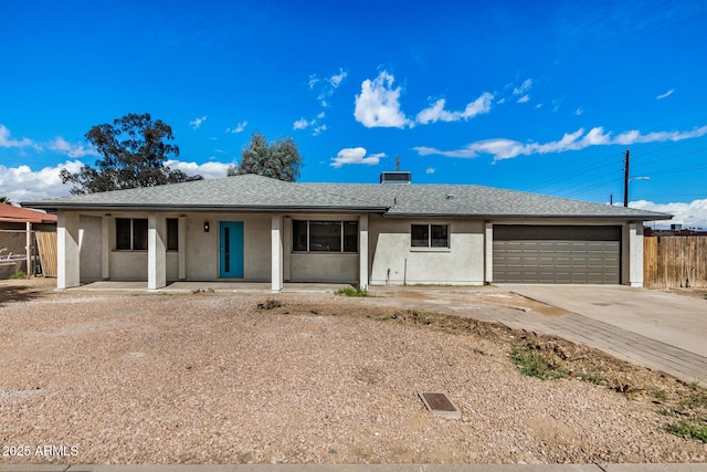 ranch-style home featuring a garage