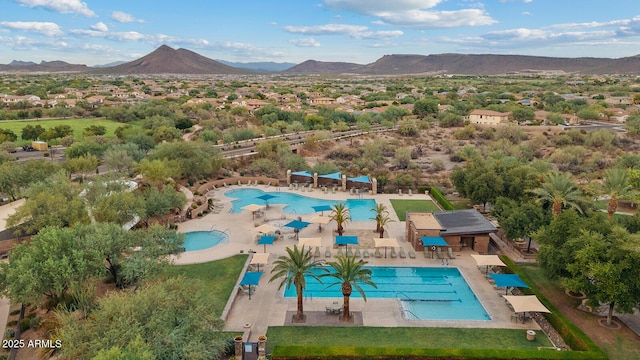 pool featuring a mountain view and a patio