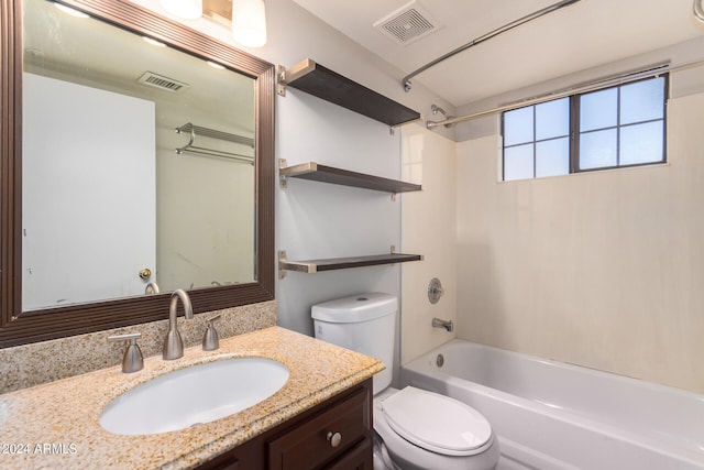 full bathroom featuring shower / bathtub combination, vanity, and toilet