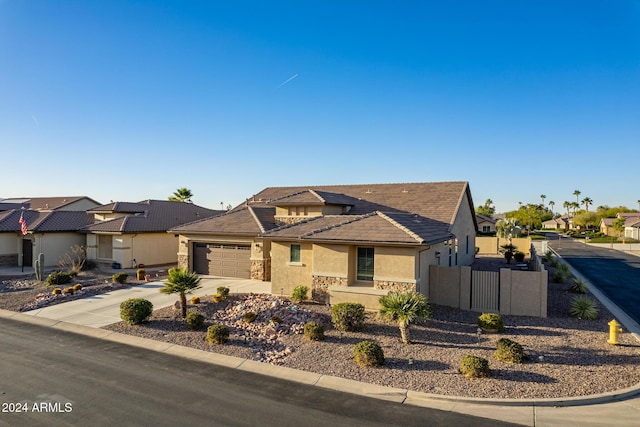 view of front of property featuring a garage