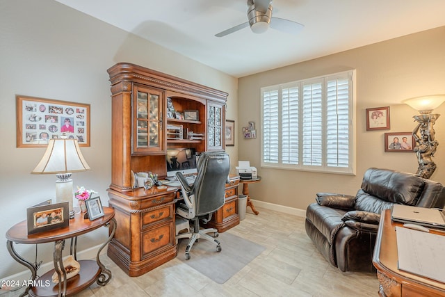 office space with ceiling fan