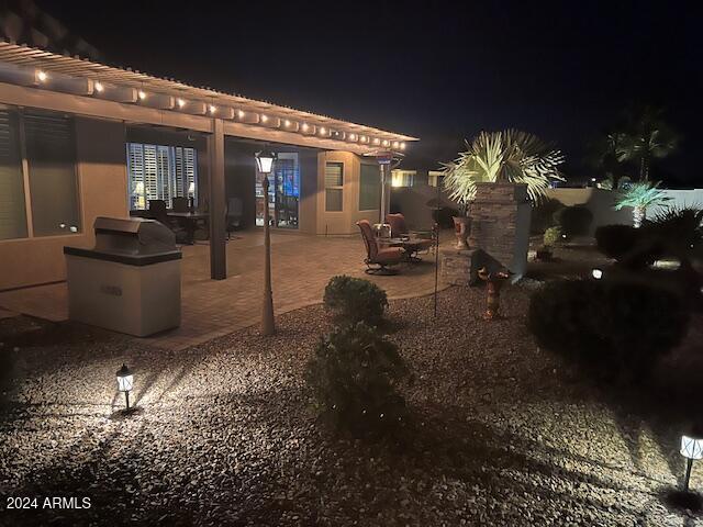 view of patio at twilight