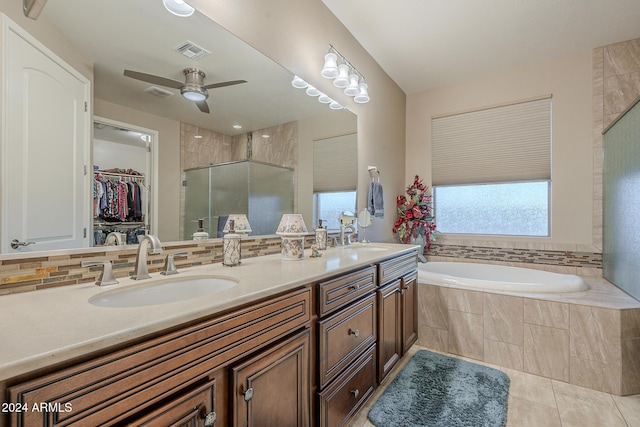 bathroom featuring separate shower and tub, vanity, tile patterned floors, and ceiling fan