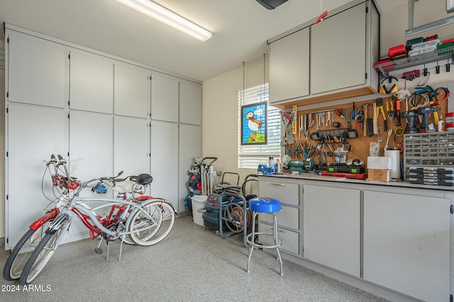 garage with a workshop area