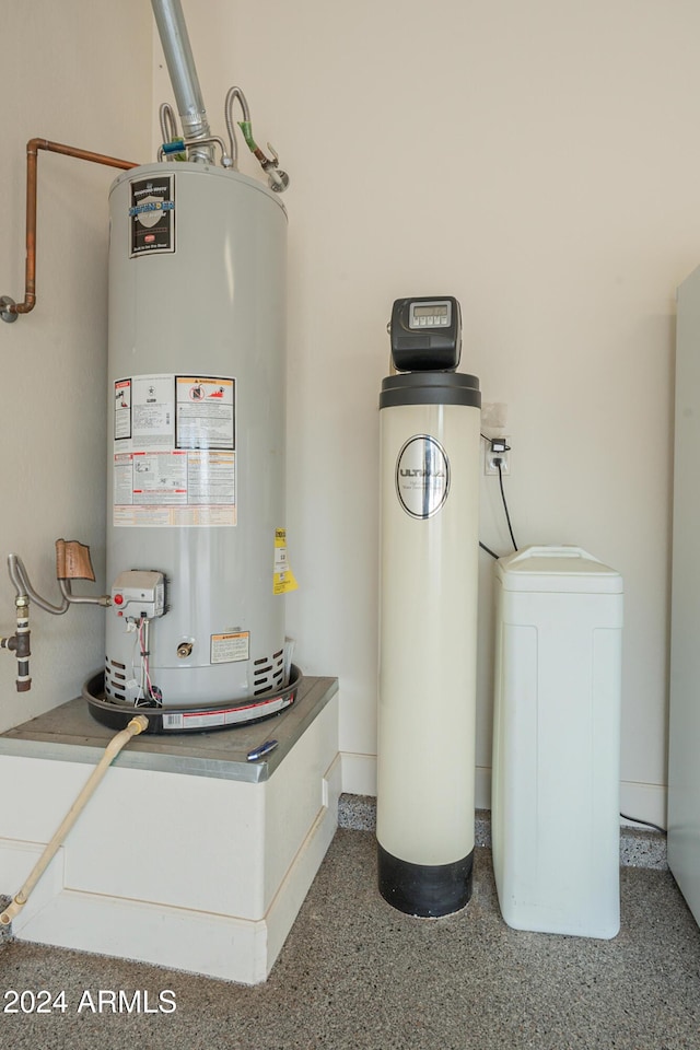 utility room with water heater