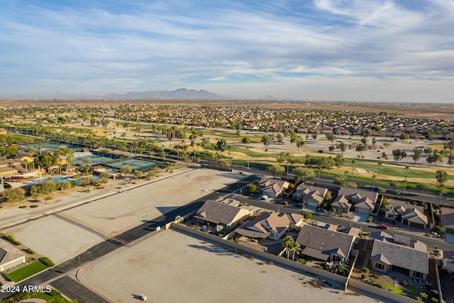 birds eye view of property featuring a mountain view