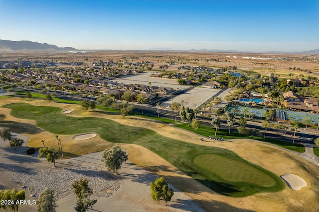 birds eye view of property featuring a mountain view