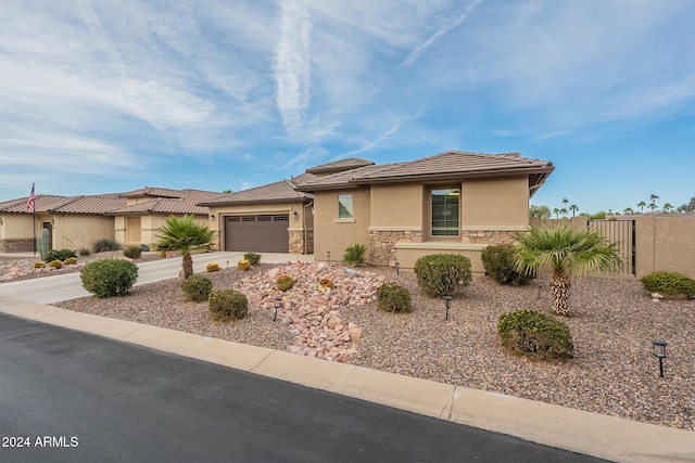 view of front of property featuring a garage