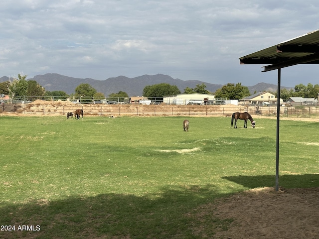 view of home's community featuring a mountain view and a rural view