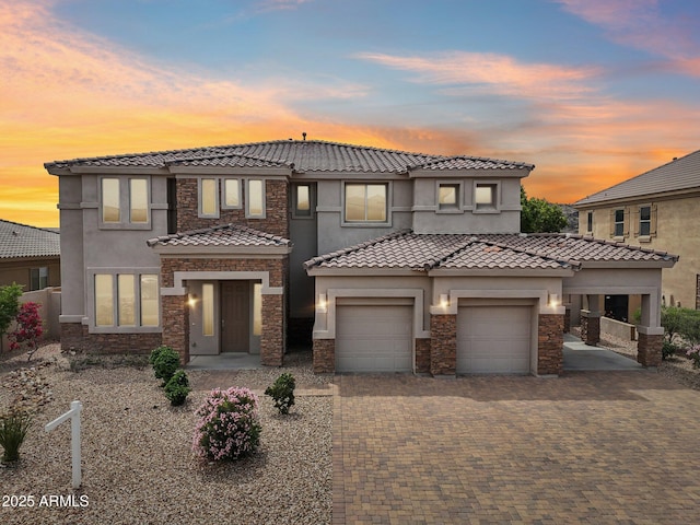 5557 W Mine Trl, Phoenix, AZ 85083 - view of front of house featuring stone siding, stucco siding, an attached garage, and a tile roof