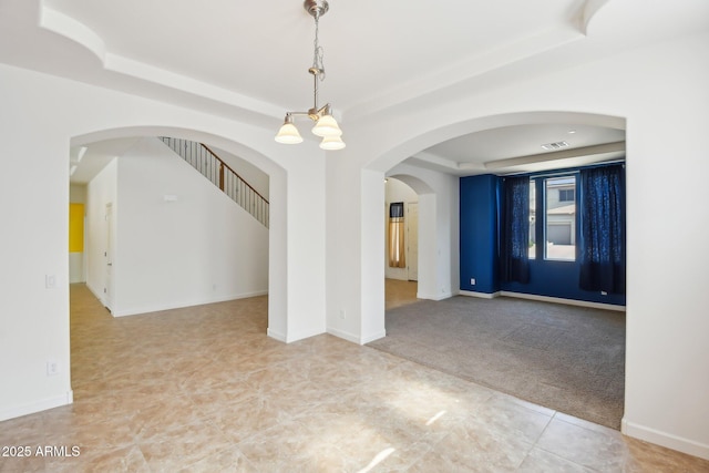 5557 W Mine Trl, Phoenix, AZ 85083 - carpeted spare room with a raised ceiling, tile patterned flooring, and baseboards