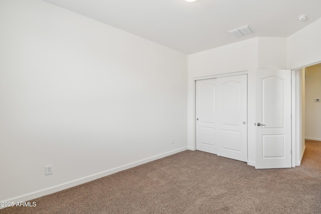 5557 W Mine Trl, Phoenix, AZ 85083 - unfurnished bedroom featuring carpet, baseboards, and a closet
