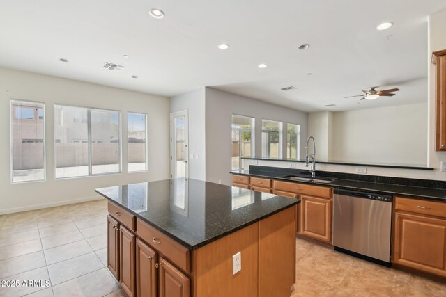 5557 W Mine Trl, Phoenix, AZ 85083 - kitchen with dishwasher, a sink, light tile patterned floors, brown cabinetry, and recessed lighting