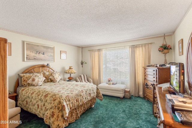 bedroom featuring dark carpet, crown molding, and a textured ceiling