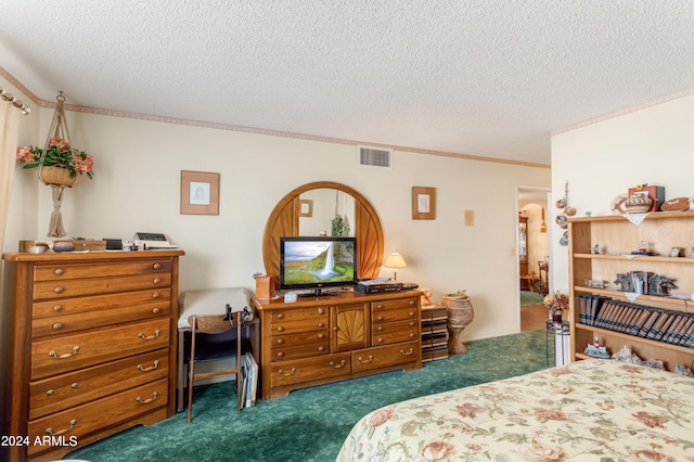 carpeted bedroom with a textured ceiling and ornamental molding